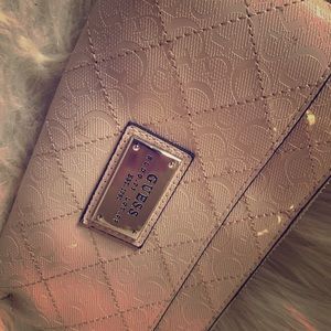 Cute pink Guess wristlet